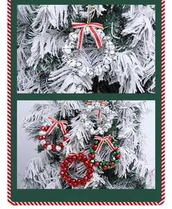 Colorful Christmas bell wreath ornaments with red ribbons hanging on a snowy tree