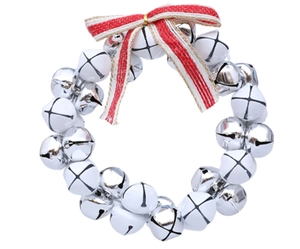 Detail of silver and white metal bells wreath with a red and white striped burlap bow