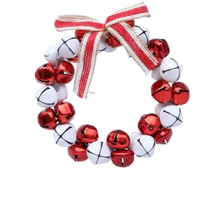 Detail of red and white Christmas bell wreath with a striped ribbon bow decoration
