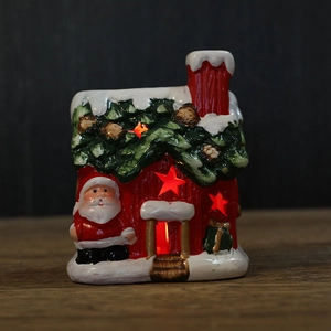 Casa de Navidad de cerámica con luces LED y figura decorativa de Papá Noel
