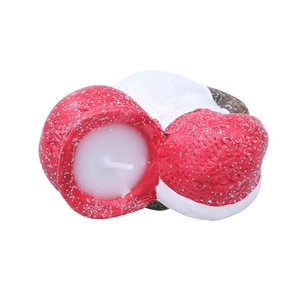 Set of two Christmas ceramic paraffin candle ornaments with snowy glitter finish