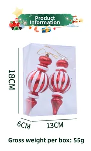 Details von rot-weiß gestreiften Weihnachtskugeln mit goldener Schnur in Klarsichtbox