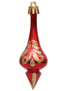 Close-up of red teardrop Christmas ornament with golden glitter scroll patterns