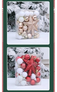 Detail of assorted Christmas ball ornaments in luxury gift sets with glitter tree toppers