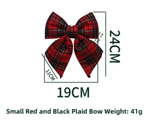 Detail view of a 19x24cm red and black buffalo plaid Christmas bow decoration