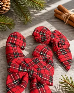 Detail of red and black checkered bow ornament for Christmas tree and festive decor