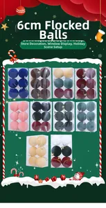 Close-up of 6cm flocked Christmas baubles in various colors for festive tree decoration