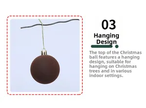 Detail of dark brown flocked Christmas ball with golden string hanging on a branch