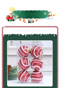 Detailed view of 6-piece red Christmas balls with white pearl spiral glitter patterns