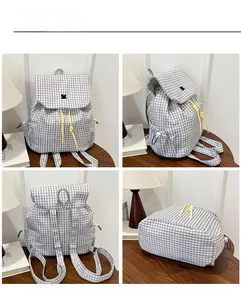 Detail shots of a grey checkered nylon backpack featuring yellow drawstrings and cat logo