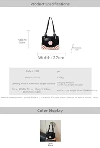 Detail view of black tote bag with apple embroidery and red polka dot base features