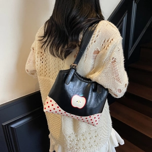 Cute apple polka dot tote bag for summer with contrast base and stylish black handles