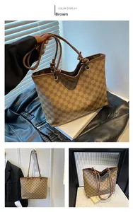Detail of a brown vintage tote bag featuring decorative knots and geometric pattern