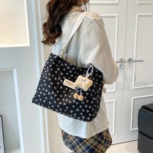 2025 Large black nylon tote bag with white bow pattern and plush charm on shoulder
