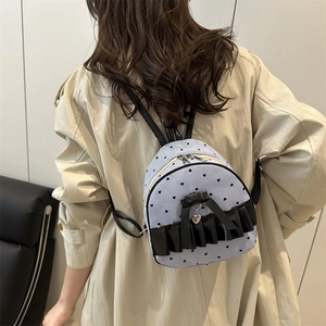 Mini striped bow backpack for women with heart patterns and elegant ruffles design