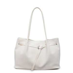 White woven faux leather tote bag with long shoulder straps and decorative buckle strap