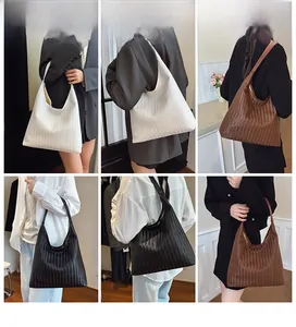 Detailed views of women woven hobo shoulder bags in white black and brown colors