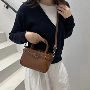 Vintage brown leather crossbody square bag with silver buckle and adjustable shoulder strap