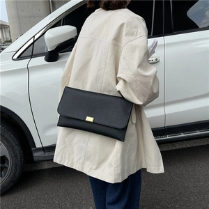 Retro black square shoulder bag with gold metal buckle and elegant chain strap for women