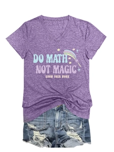 Detail of V-neck purple t-shirt with 'Do Math Not Magic' text and ripped denim shorts