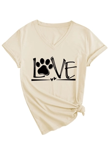 Detail of V-neck beige T-shirt featuring LOVE print and stylish knotted hem design