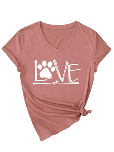 Detail of V-neck rose pink t-shirt with LOVE paw print graphic and stylish front knot hem