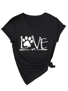 Detail of V-neck T-shirt showing LOVE print with paw pattern and stylish hem knot
