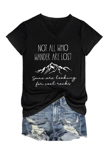 Detail of V-neck black T-shirt with mountain print and Not All Who Wander Are Lost text