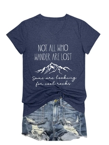 Detail of V-neck t-shirt with Mountain graphic and Not All Who Wander Are Lost text