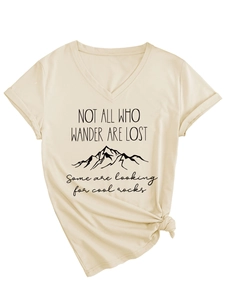 Detail of V-neck T-shirt showing outdoor mountain print and knot detail on the side