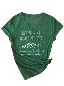 Detail of V-neck T-shirt in dark green with Not All Who Wander Are Lost mountain print