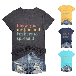 Detail of four colorful V-neck cotton T-shirts with literacy slogan and denim shorts