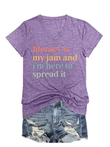 Detail of purple V-neck literacy slogan T-shirt paired with distressed denim shorts