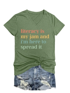 Detail of green V-neck T-shirt with literacy slogan and blue distressed denim shorts