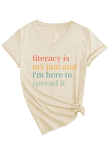 Detail of V-neck beige T-shirt featuring colorful literacy slogan and hem knot design