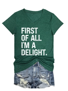 Detail of V-neck dark green t-shirt with First Of All I'm A Delight distressed print