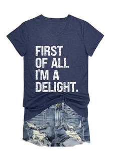 Detail of V-neck navy blue t-shirt with white letter print and ripped denim shorts