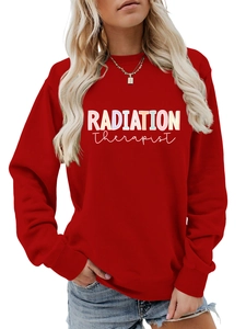 Close-up of colorful Radiation Therapist lettering on red crewneck sweatshirt