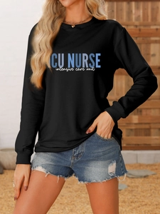 Detail of black ICU Nurse sweatshirt with ribbed cuffs and professional blue typography