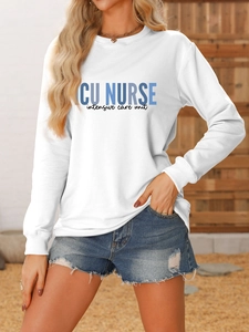 Detailed close-up of ICU NURSE printed logo on high-quality white crewneck sweatshirt