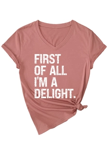 Detail of V-neck T-shirt showing First Of All I'm A Delight print and side knot hem