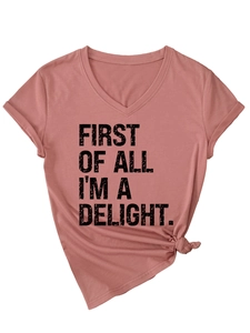Detail of V-neck T-shirt showing printed text and stylish front hem knot decoration