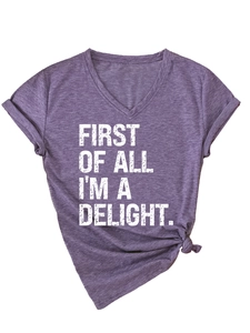 Detail of V-neck purple t-shirt with FIRST OF ALL I'M A DELIGHT print and knotted hem