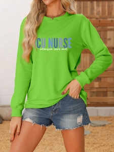 Close-up of bright green ICU Nurse sweatshirt showing ribbed cuffs and knit texture