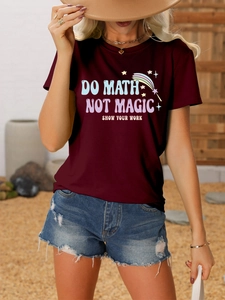 Detail of Do Math Not Magic typography and graphic art on burgundy cotton t-shirt