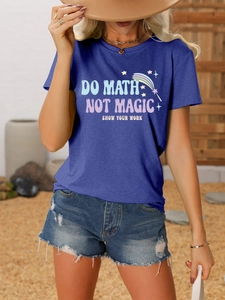 Detail of Do Math Not Magic slogan print on a dark blue cotton t-shirt with rainbow graphics
