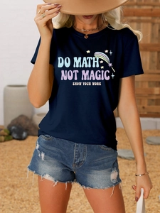 Detail of Do Math Not Magic Show Your Work print on a navy blue cotton t-shirt