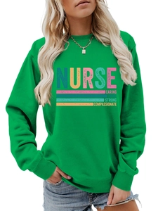 Detail of green nurse sweatshirt with caring loyal strong print and vintage typography