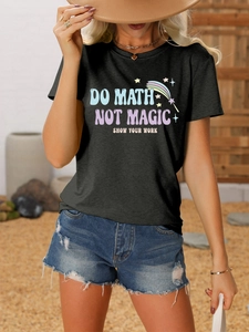 Detail of Do Math Not Magic slogan print on a black cotton short sleeve T-shirt for women