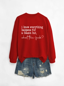Red crewneck sweatshirt with 'Everything Happens for a Reason' print and ripped denim shorts